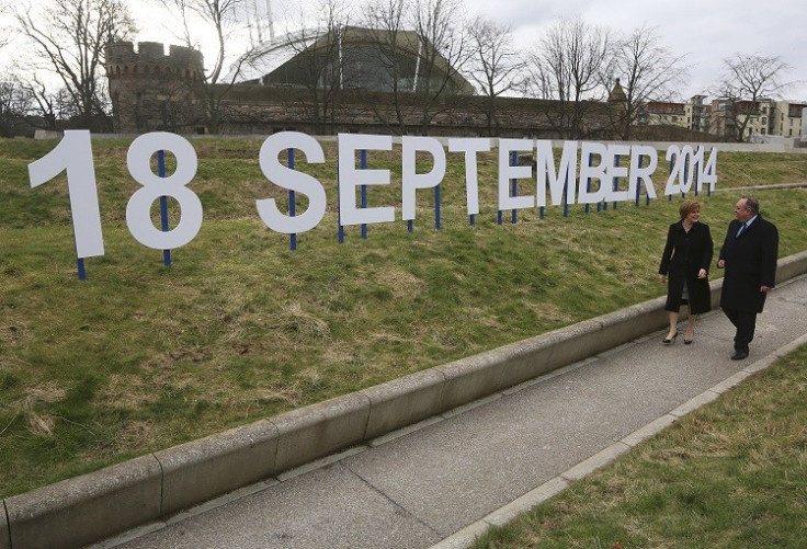 Scotland's First Minister and leader of the Scottish National Party (SNP) Alex Salmond and his deputy leader Nicola Sturgeon in front of a sign indicating the date of Scotland's independence referendum (Photo: Reuters)