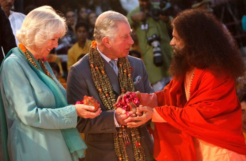 The royal couple follow the sage's instruction to perform religious rituals. (Photo: Reuters)