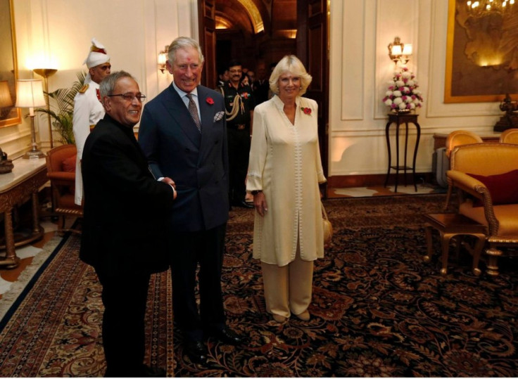 Prince Charles shakes hands with India's President Mukherjee before their meeting in New Delhi. (Photo: Reuters)