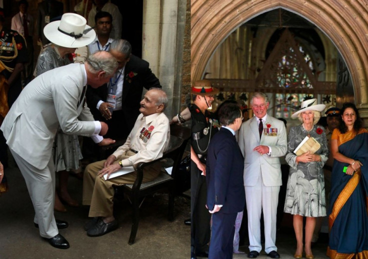 Prince Charles and Camilla meet a war veteran, Madahukar Dongre (L), at Mumabai's Afghan Church where they attended Remembrance Day Service. (Photo: REUTERS/Rafiq Maqbool)