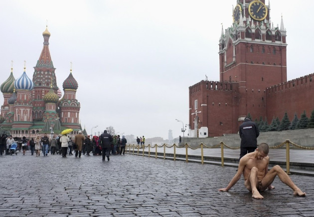 Pytor Pavlensky mounts protest by nailing his genitals to pavement in Red Square PIC: Reuters Pytor Pavlensky mounts protest by nailing his genitals to pavement in Red Square PIC: Reuters