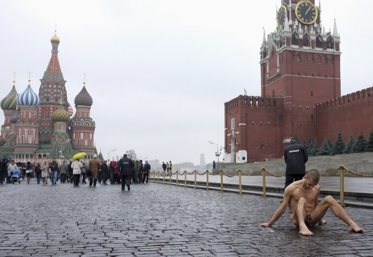 Pytor Pavlensky mounts protest by nailing his genitals to pavement in Red Square PIC: Reuters