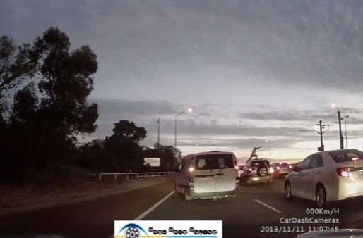Man headbutts cars Man headbutts cars