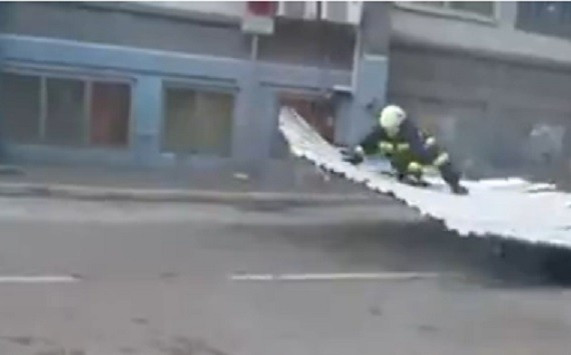 Firefighter lifts off during high winds in Rijeka, Croatia PIC: Liveleak Firefighter lifts off during high winds in Rijeka, Croatia PIC: Liveleak