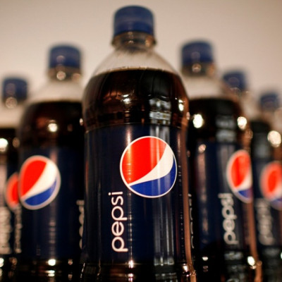 PepsiCo Shares Rise as Firm Raises Outlook for The Year