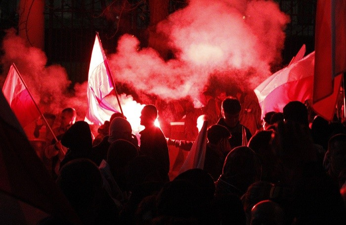 Protesters in front of the building of Russian embassy during the annual far-right march, which coincides with Poland's national Independence Day (Reuters)
