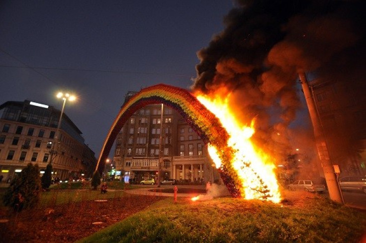A  rainbow-coloured arch symbolising tolerance was also burned in the violence (Reuters)