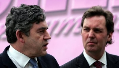 Milburn (right) was brushed aside by Brown Milburn (right) was brushed aside by Brown