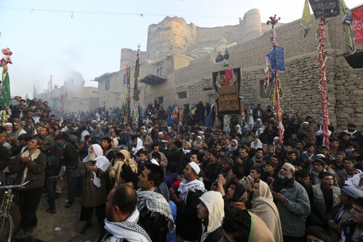 Afghans pray a procession held to mark Ashura in Kabul. (Photo: REUTERS/Omar Sobhani)