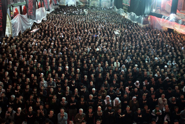 Pilgrims pray at the Imam al-Abbas shrine during Ashura in Kerbala, about 80 km southwest of Baghdad in Iraq. (Photo: REUTERS/Mushtaq Muhammed)