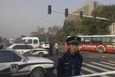 Two police officers were killed and a further two injured in an attack in Xinjiang, which left nine attackers dead. (Reuters)
