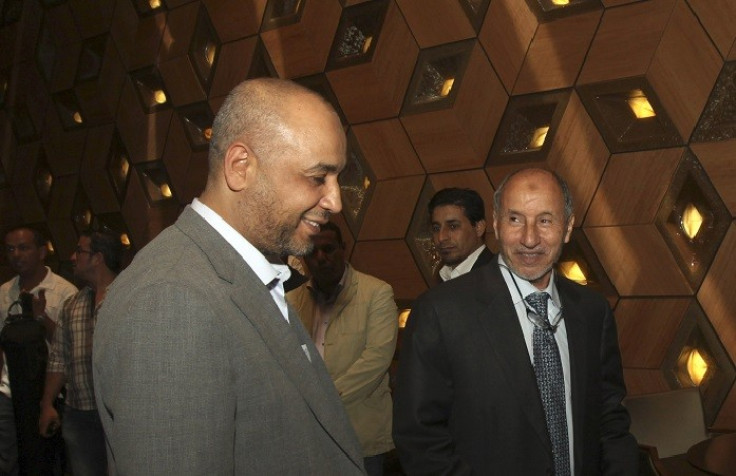 Mustafa Noah (left) with Libyan National Transitional Council chairman Mustafa Abdel Jalil. (Reuters)