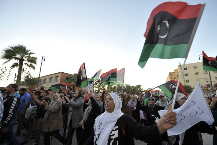 Libyan protesters demonstrate against the presence of militias who refuse to disarm two years after ousting Gaddafi from power. (Reuters)