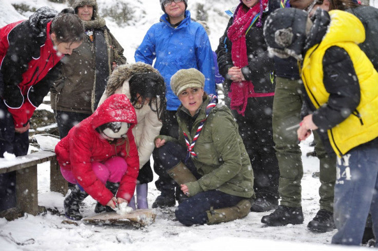 Braving the cold weather Kate Middleton, then five months pregnant, attends a scouting event in Cumbria in March 2013. (Photo: REUTERS/Andy Stenning)