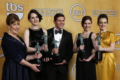 ITV broadcasts popular dramas such as Downton Abbey. Here, Cast members of the TV drama Downton Abbey hold their award for "outstanding performance by an ensemble in a drama series" backstage at the 19th annual Screen Actors Guild Awards in Los