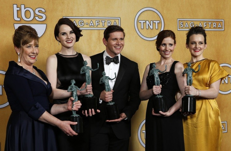 ITV broadcasts popular dramas such as Downton Abbey. Here, Cast members of the TV drama Downton Abbey hold their award for "outstanding performance by an ensemble in a drama series" backstage at the 19th annual Screen Actors Guild Awards in Los