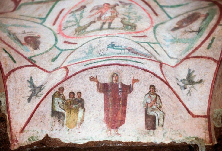 Fresco inside the catacomb of Priscilla in Rome depicts a young woman, which women group say is a priest. (Photo: REUTERS/Max Rossi)