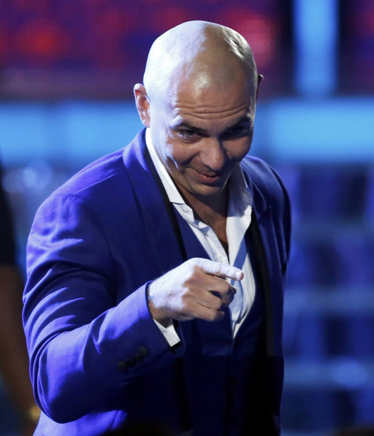 Pitbull accepts the Best Urban Peformance award for his song "Echa Pa'lla" during the 14th Latin Grammy Awards in Las Vegas