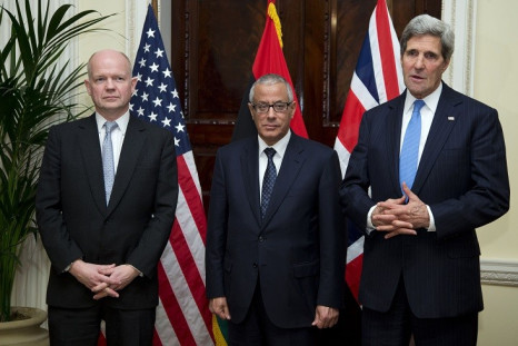 US Secretary of State John Kerry (R) speaks to the media as British Foreign Secretary William Hague (L) and Libyan Prime Minister Ali Zeidan stand with him at the Winfield House, the residence of the US Ambassador to Britain, on 24 November, 2013. (Photo: