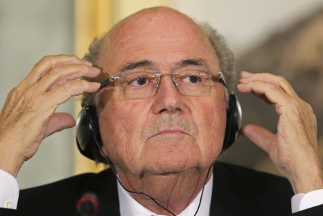 FIFA President Sepp Blatter speaks during a news conference in Doha