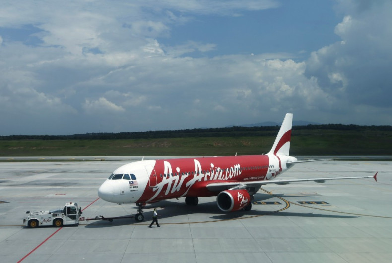 Authorities checking reports of missing Air Asia flight crashing in East Pacific Islands