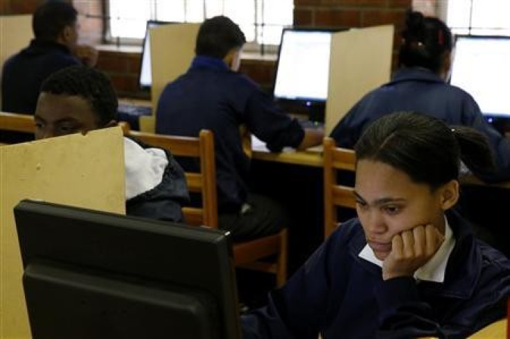 Students use computers to study at Elswood Secondary School in Cape Town