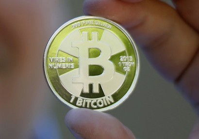 Bitcoin reaches $1,000 for First time