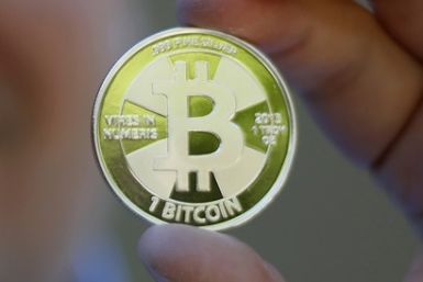 Bitcoin reaches $1,000 for First time
