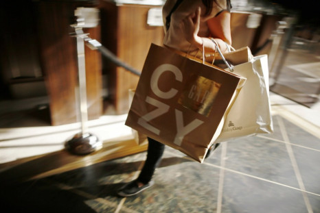 Shopper carries Gap shopping bags at The Grove mall in Los Angeles
