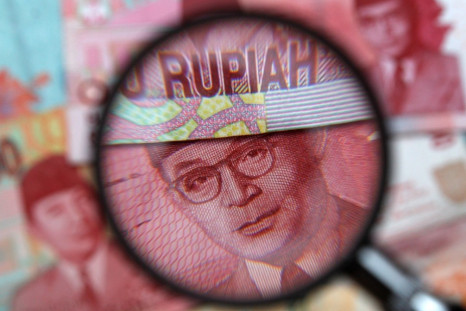 Indonesia's rupiah drops below 12,000 a dollar for the first time since 2009