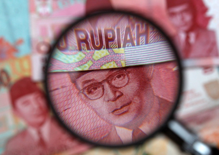 Indonesia's rupiah drops below 12,000 a dollar for the first time since 2009
