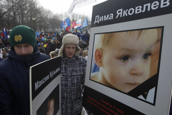 People take part in a rally in defence of Russian children in Moscow