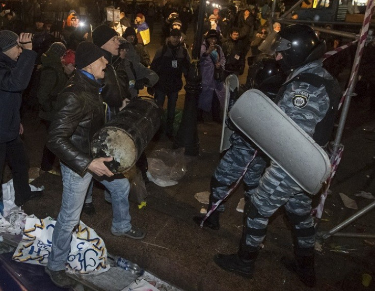 Riot police crash with pro-EU protesters in Ukraine’s Independence Square on Saturday. (Reuters)