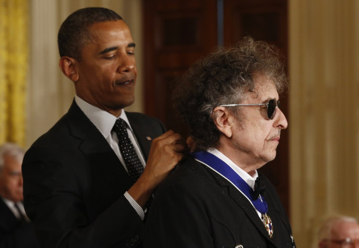 Bob Dylan is awarded the Presidential medal of Freedom in 2012 by Barack Obama.