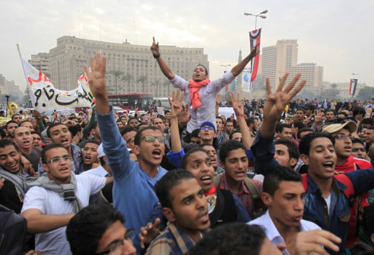 Pro-Mursi university students and supporters of the Muslim Brotherhood occupy Tahrir Square for the first time since the removal of President Mohamed Mursi in Cairo