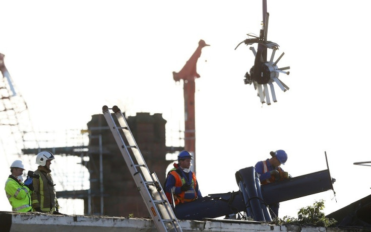 Rescuers remove helicopter from the Clutha pub after tragedy in Glasgow PIC: Reuters