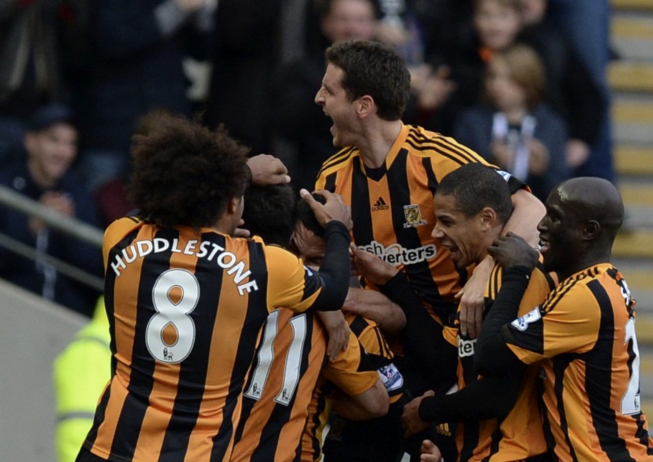 hull city players celebrate goal against liverpool, december 1