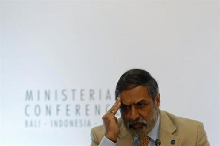 India's trade minister Anand Sharma listens during a news conference at the ninth World Trade Organization (WTO) Ministerial Conference in Nusa Dua, on the Indonesian resort island of Bali December 5, 2013.