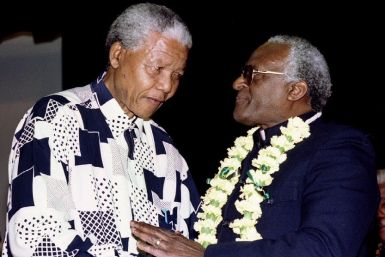 Nelson Mandela wearing a shirt to bring out the vari-focal tint in Desmond Tutu's glasses PIC: Reuters