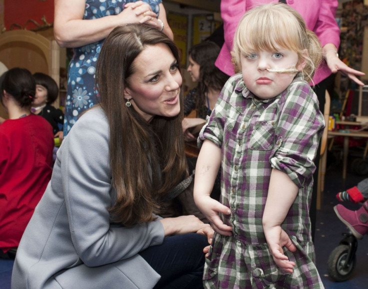 Kate Middleton meets children at Shooting Star House children's hospice in Hampton, Middlesex, December 6, 2013. (Photo: REUTERS/Bradley Page)