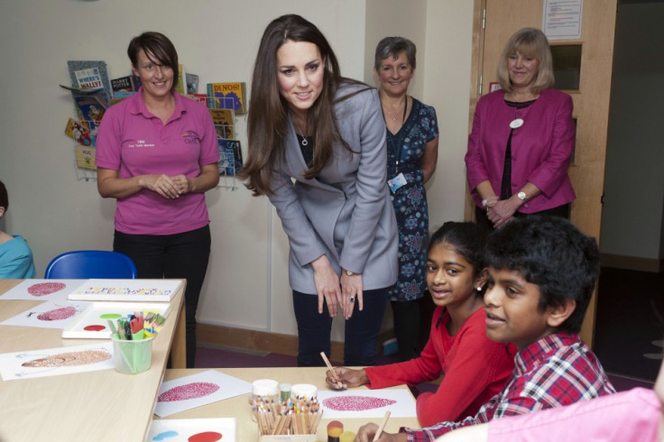 Kate also took part in an arts and crafts activity. (Photo: REUTERS/Bradley Page)