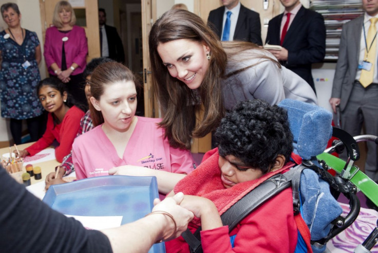 Kate endeared herself to children with her motherly warmth. (Photo: REUTERS/Bradley Page)