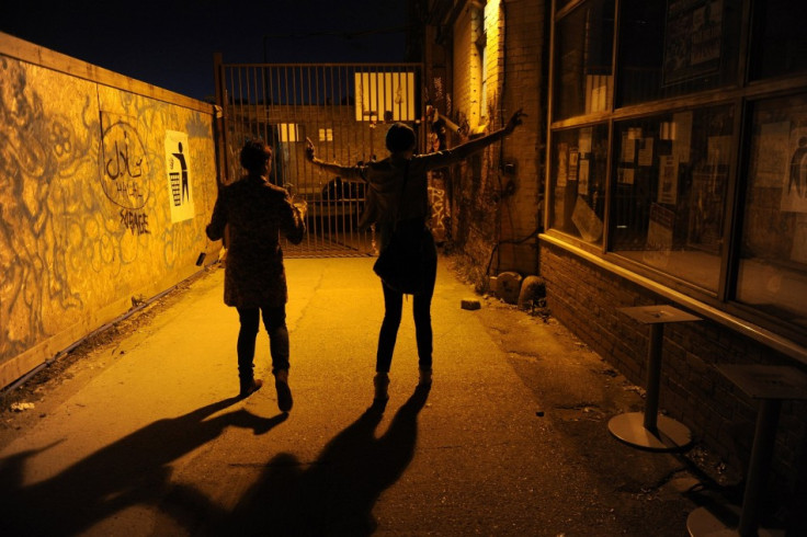 Two women leave a bar in Hackney Wick, east London.