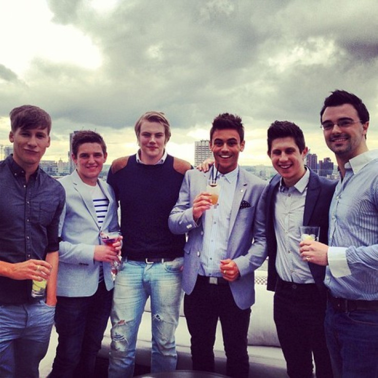 Dustin Lance Black (L) and Tom Daley (second from right). Photo: Instagram / tomdaley1994