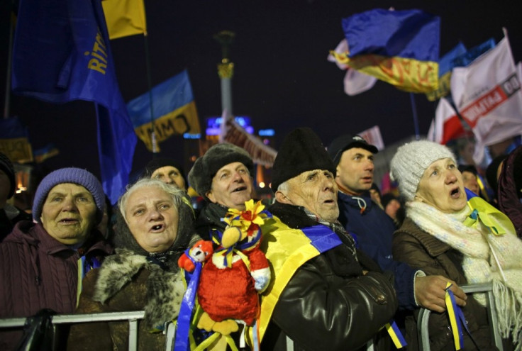 People attend a rally organized by supporters of EU integration in central Kiev.