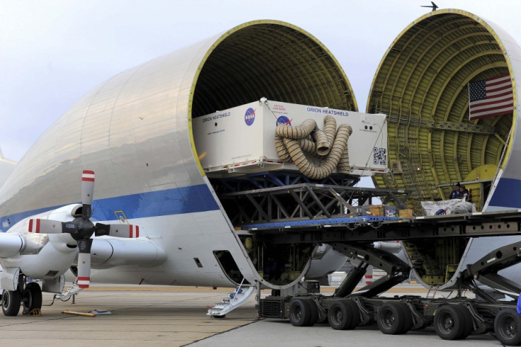 The heat shield for NASA's Orion spacecraft was loaded onto a Super Guppy plane for transport to Florida's Kennedy Space Center, in Manchester, New Hampshire, in this NASA handout photo taken December 4, 2013.