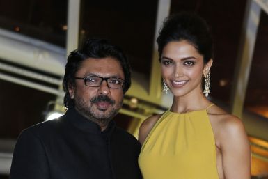 Indian actress Deepika Padukone and Indian director Sanjay Leela Bhansali (R) attend the opening of the 13th annual Marrakech International Film Festival in Marrakech November 29, 2013. (REUTERS/Youssef Boudlal)
