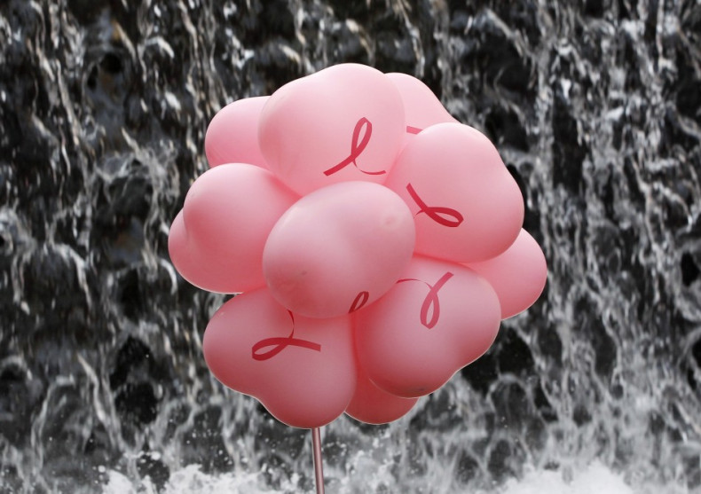 Pink balloons are displayed in front of an artificial waterfall during the "Pink Ribbon" breast cancer awareness campaign at Cheonggye Stream in central Seoul October 5, 2011. (Reuters)