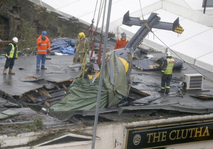 Wreck of police helicopter lodged inside The Clutha pub PIC: Reuters