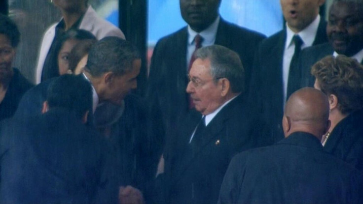 Obama shook hands with Raul Castro before kissing Brazil president Dilma Rousseff